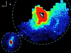 Flagrante csmico mostra galxia roubando estrelas de sua vizinha