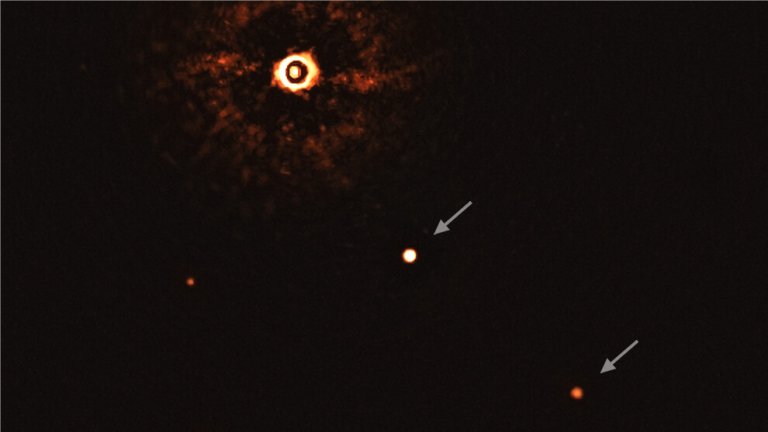 Sistema multiplanetrio  fotografado pela primeira vez